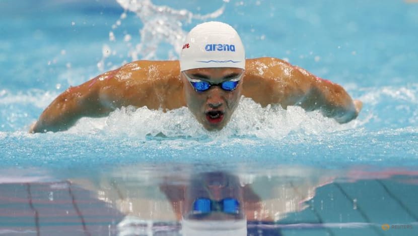 Hungary's Milak smashes own swimming world record, triple gold for US