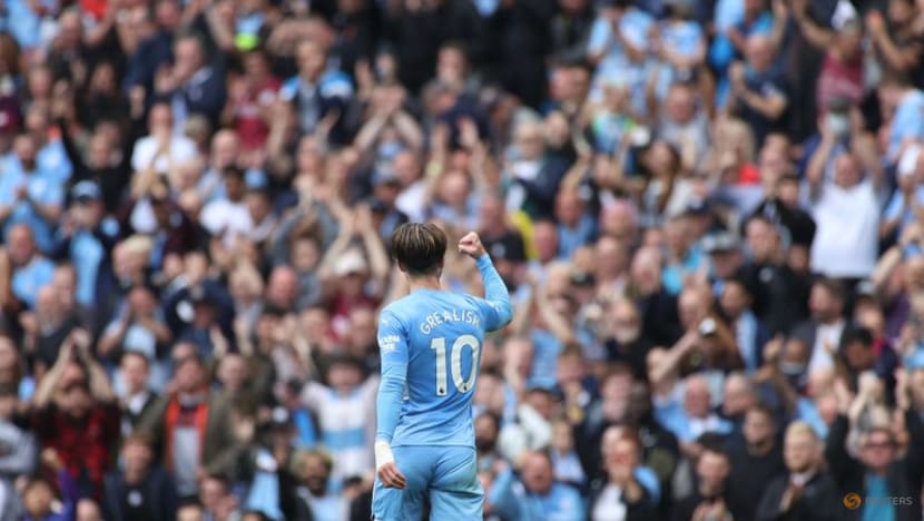 Soccer-Grealish on target as Man City put five past hapless Norwich