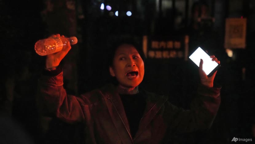 Mother says China protester released after 30 days' detention Mother says China protester released after 30 days' detention