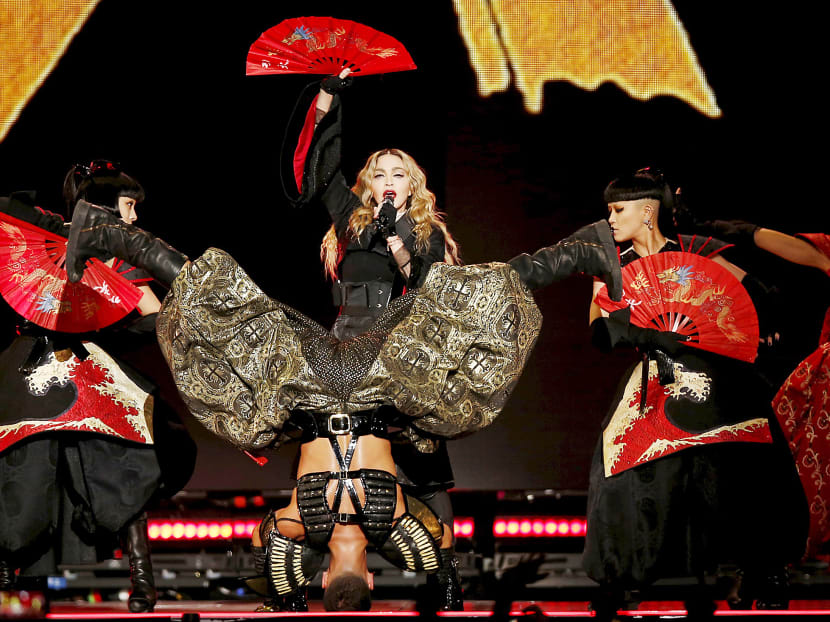 Singer Madonna performs during her concert at the AccorHotels Arena in Paris, France, Dec 9, 2015, on her Rebel Heart Tour. Photo: Reuters Singer Madonna performs during her concert at the AccorHotels Arena in Paris, France, Dec 9, 2015, on her Rebel Heart Tour. Photo: Reuters