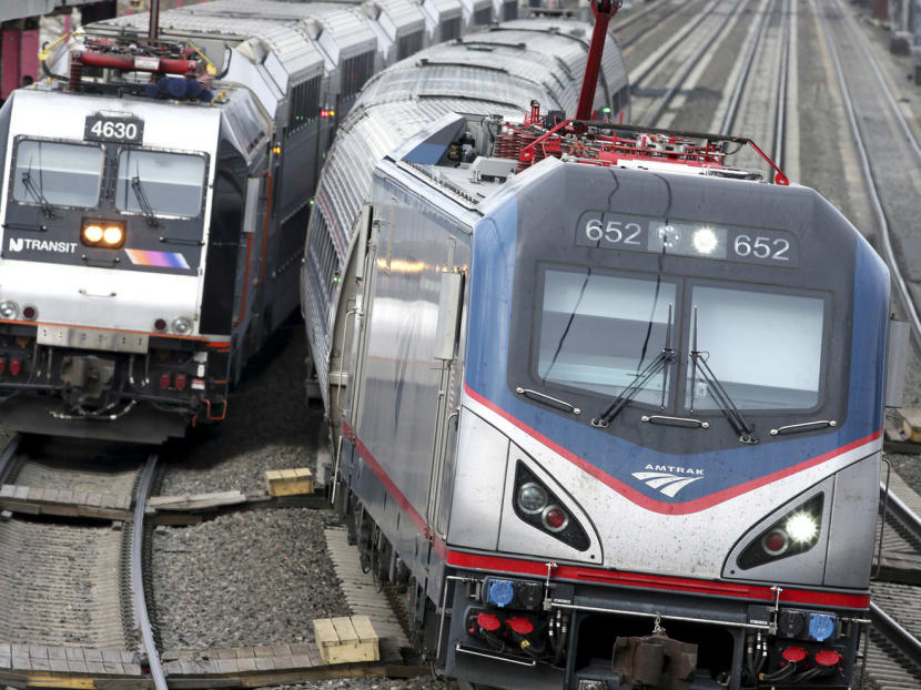 An train passing a New Jersey Transit train along Amtrak’s North-east Corridor railway. German group Siemens uses the Internet of Things to prevent delays by its locomotives on the railway line. Photo: AP