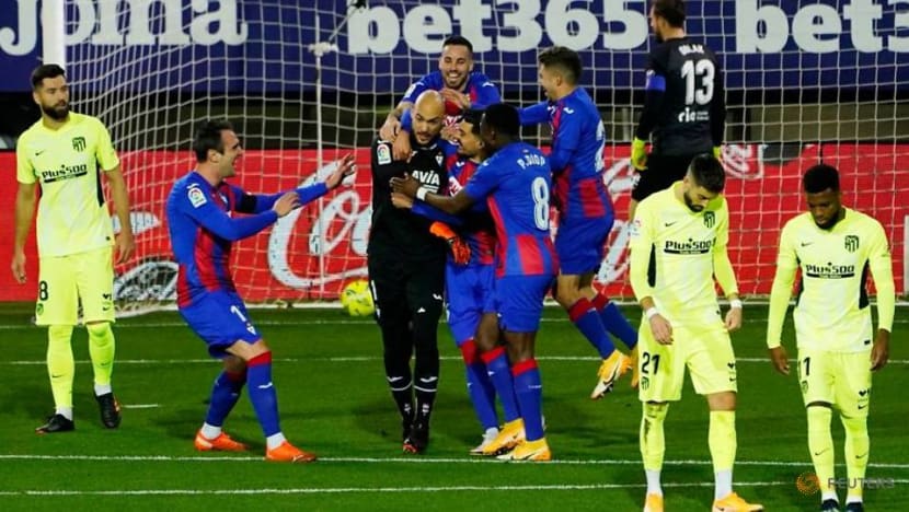Suarez secures Atletico win despite Eibar's keeper scoring a penalty Suarez secures Atletico win despite Eibar's keeper scoring a penalty