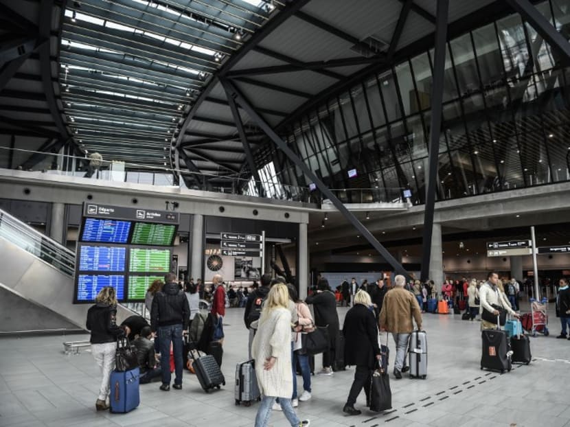 Travellers at the new Lyon Saint Exupery airport Terminal 1, in Lyon, France. There has been a proliferation of security apps which deliver incident updates in the location where a user is travelling. Many also contain a panic button to summon assistance in an emergency. Photo: AFP