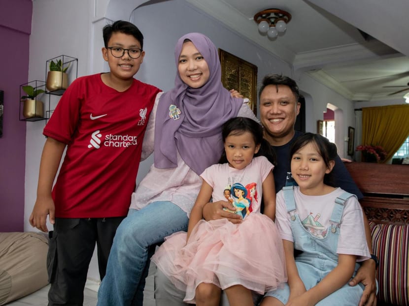 Singaporean couple, Mr Muhammed Ridzwan Aminuddin, 40, and Ms Nurulhuda Sa’ari, 38, with their three children, Mikhael Muhammed Ridzwan, 12, Indah Muhammed Ridzwan, 6, and Nayla Muhammed Ridzwan, 9, on July 29, 2022. Singaporean couple, Mr Muhammed Ridzwan Aminuddin, 40, and Ms Nurulhuda Sa’ari, 38, with their three children, Mikhael Muhammed Ridzwan, 12, Indah Muhammed Ridzwan, 6, and Nayla Muhammed Ridzwan, 9, on July 29, 2022.