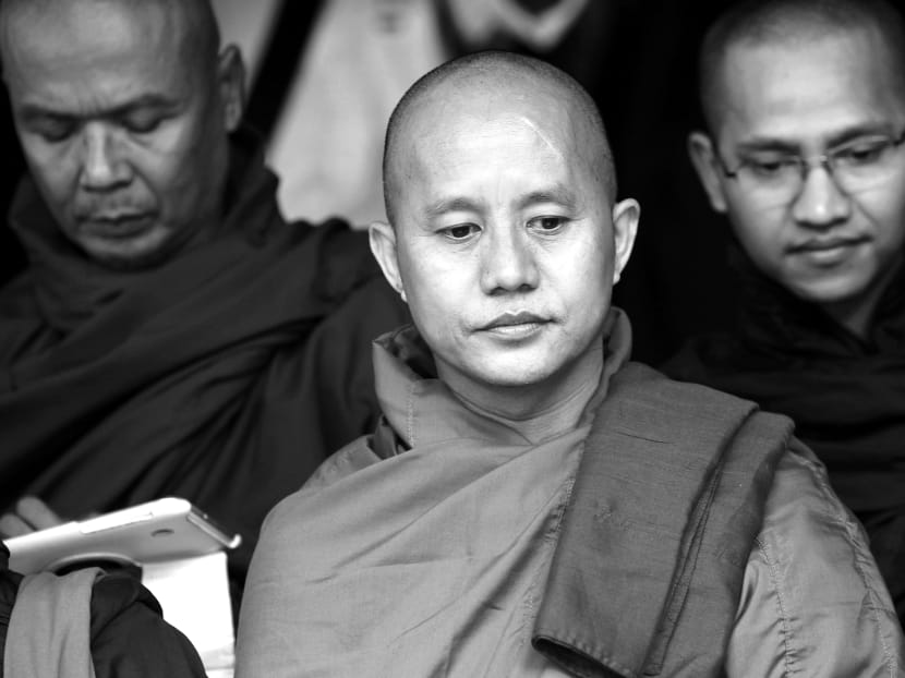 Ashin Wirathu (centre), leader of the controversial 969 Movement. Myanmarese Buddhists believe their religion is besieged by larger, better-organised faiths. PHOTO: REUTERS