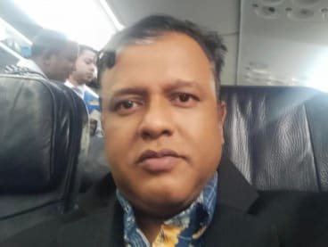 Mr Md Sharif Uddin on board a plane at Changi Airport on May 31, 2024. 