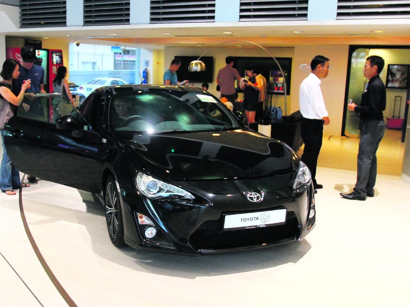 Car buyers at Ubi Borneo Motors showroom, May 11, 2014. TODAY FILE PHOTO
