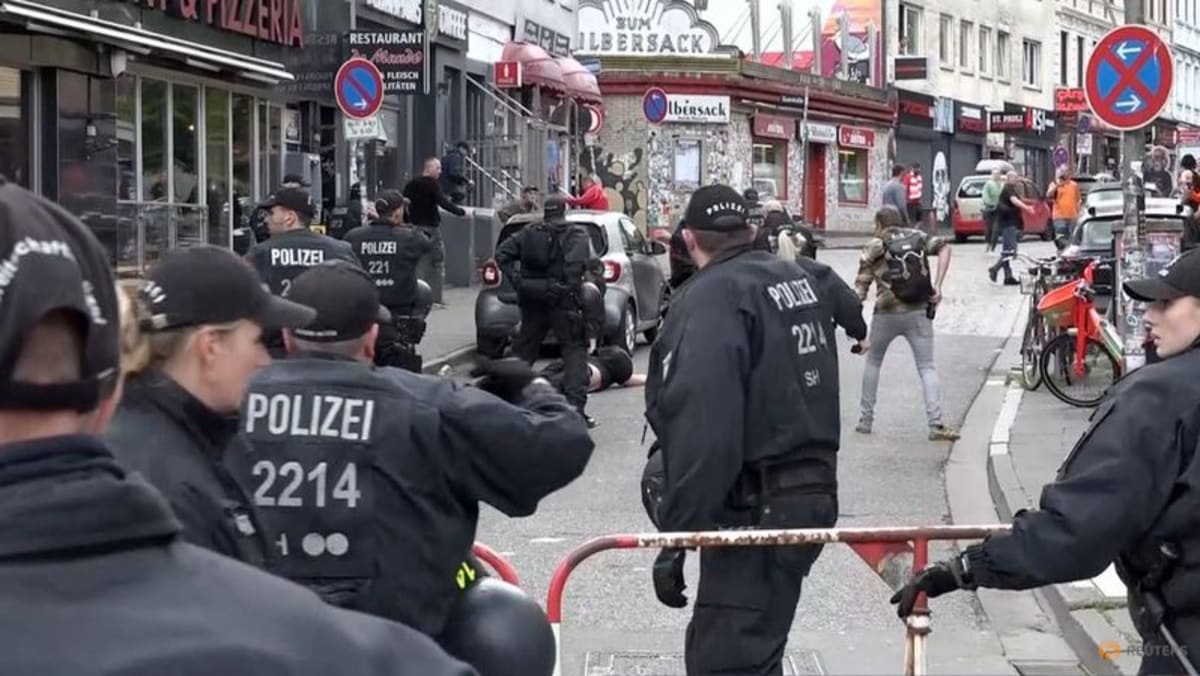 German police fire shots at axe-wielding man at Hamburg football fan parade