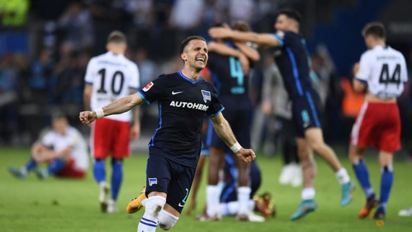 Hertha Berlin win playoff to deny Hamburg promotion to Bundesliga Hertha Berlin win playoff to deny Hamburg promotion to Bundesliga