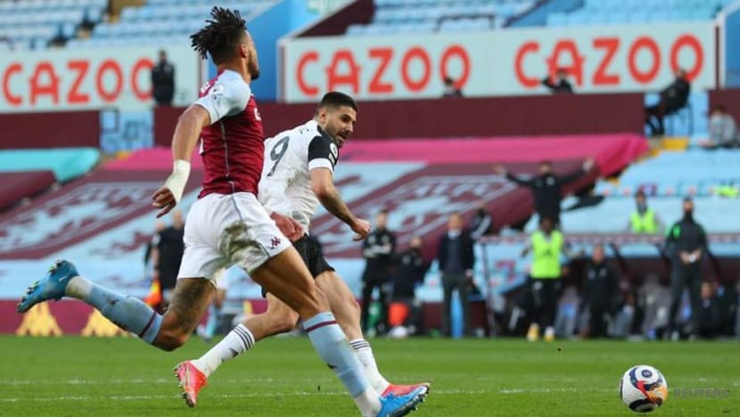 Football: Fulham blow chance to escape bottom three with late collapse at Villa
