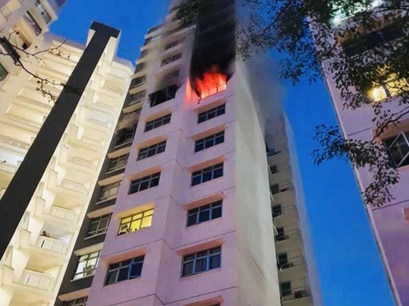 Flames seen from the exterior of the 10th-storey flat in Sengkang.