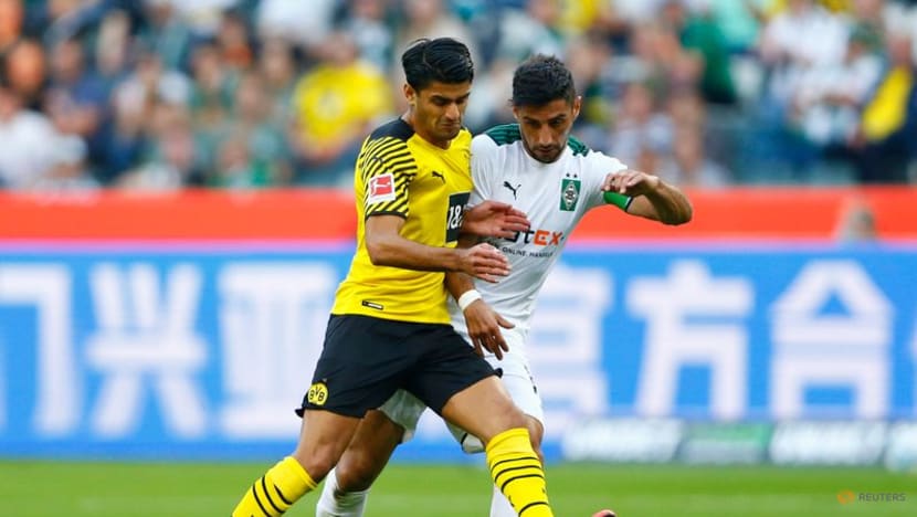 Without Haaland, 10-man Dortmund slump to 1-0 loss at Gladbach Without Haaland, 10-man Dortmund slump to 1-0 loss at Gladbach