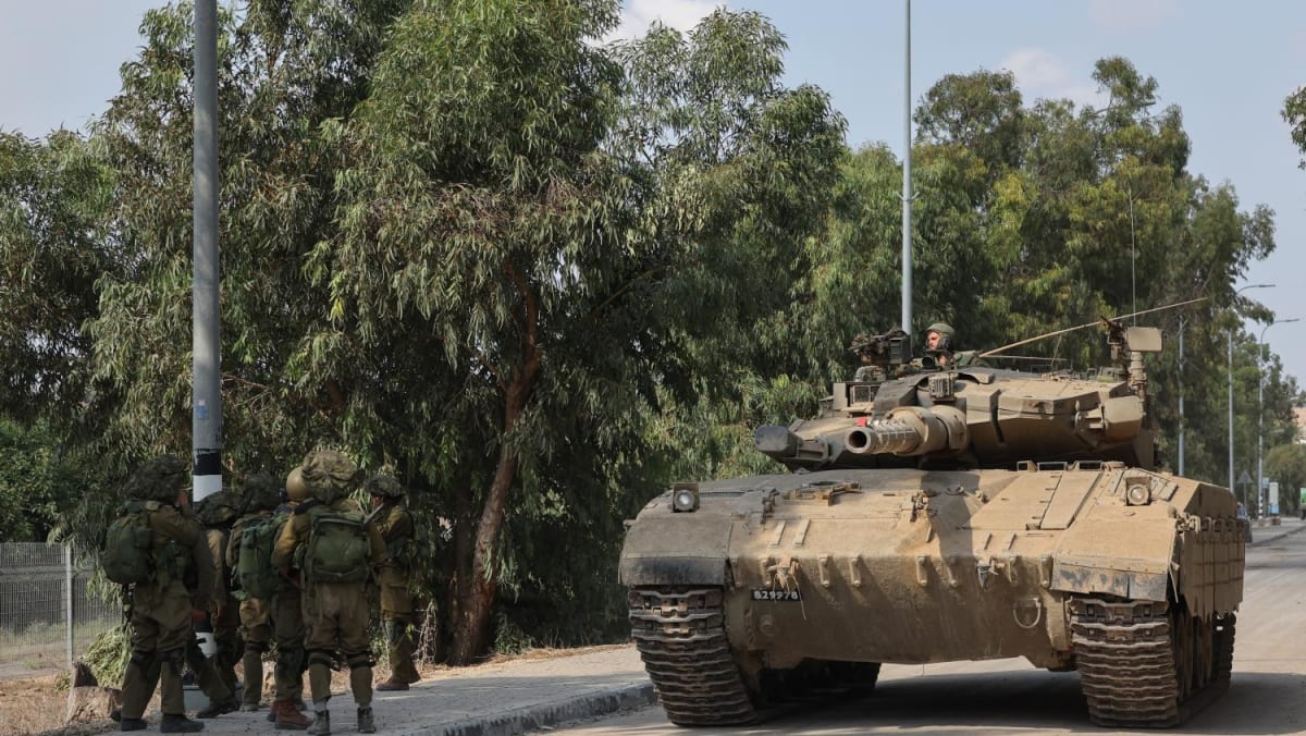 Israel retakes Gaza border area as war's toll mounts