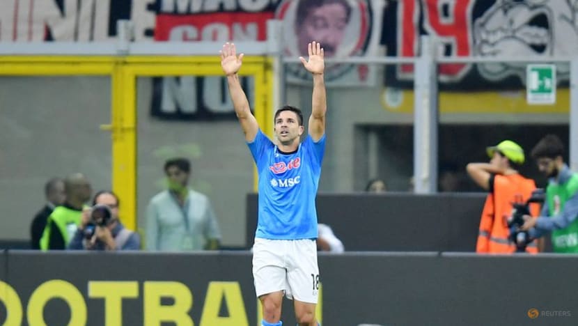 Simeone header earns Napoli 2-1 win at AC Milan Simeone header earns Napoli 2-1 win at AC Milan