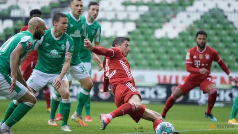 Football: Lewandowski landmark goal helps Bayern to 3-1 win at Werder Football: Lewandowski landmark goal helps Bayern to 3-1 win at Werder