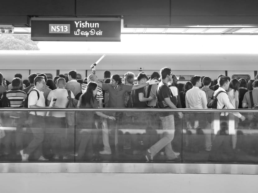 A crowd at Yishun MRT Station after train delays on July 3. The MRT system forms the backbone of the public transport system; each disruption affects thousands of commuters. TODAY File Photo