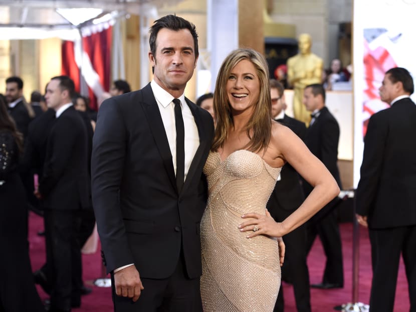 FILE - In this Feb. 22, 2015 file photo, Justin Theroux, left, and Jennifer Aniston arrive at the Oscars in Los Angeles. Photo: AP