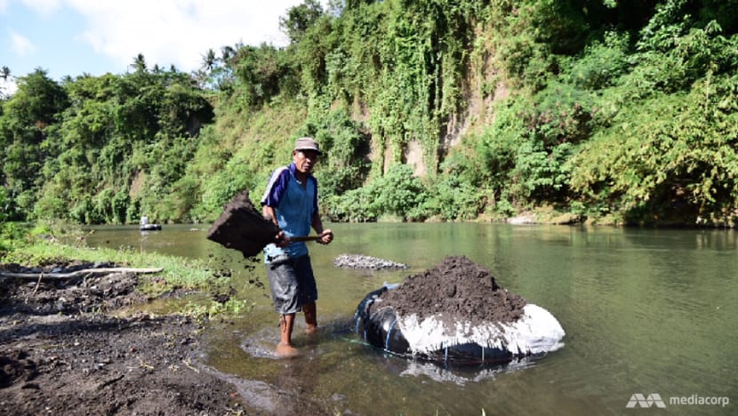 Bali river dredged ahead of probable eruption of Mount Agung Bali river dredged ahead of probable eruption of Mount Agung
