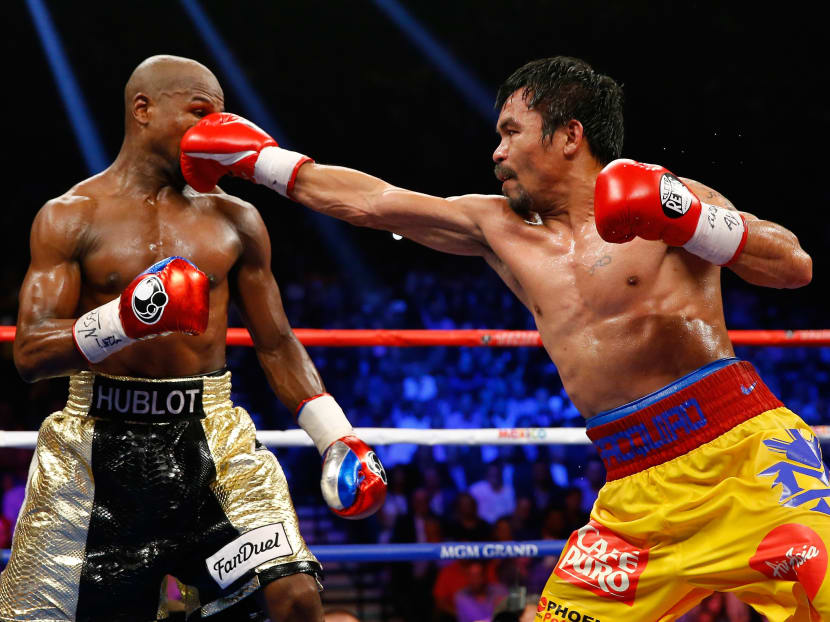 Pacquiao says shoulder injury limited him in Mayweather loss