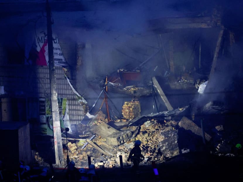 A rescuer walks at a site of a Russian missile strike, amid Russia's attack on Ukraine, in Kyiv on Nov 23, 2022. A rescuer walks at a site of a Russian missile strike, amid Russia's attack on Ukraine, in Kyiv on Nov 23, 2022.
