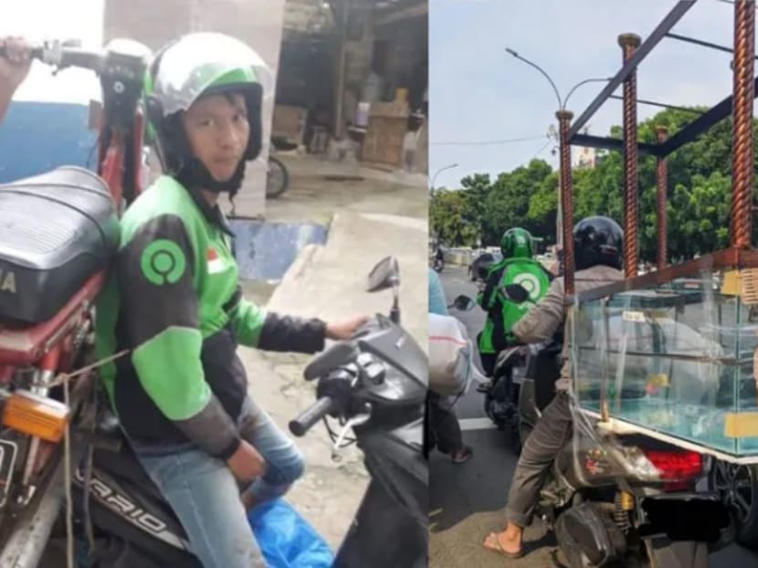 Nothing too big ― Indonesian delivery riders transport aquariums, mattresses, motorbikes and more on a regular basis