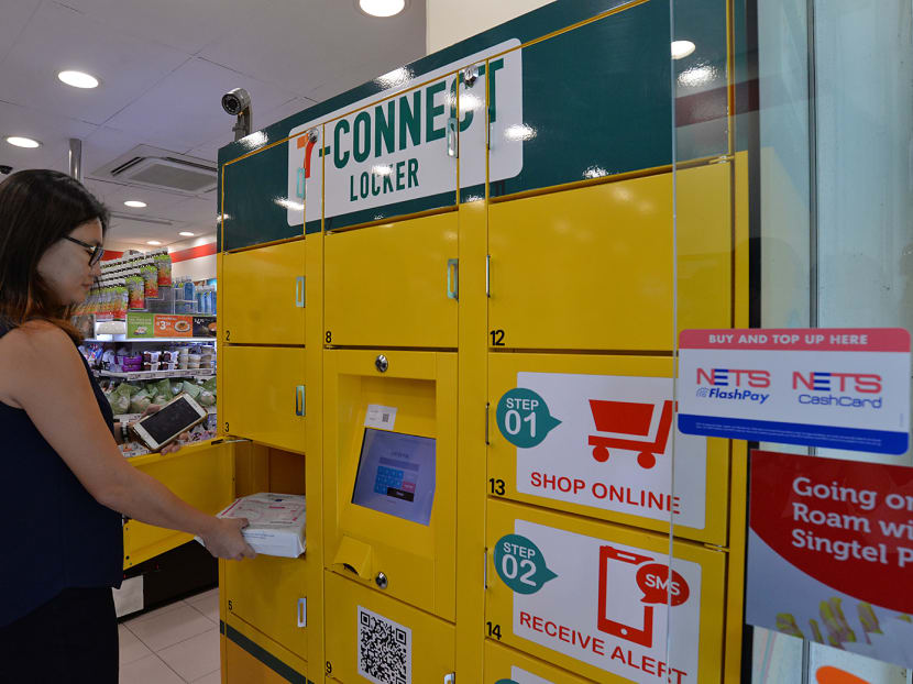 A National Healthcare Group Polyclinics (NHGP) staff demonstrating how NHGP patients can use the locker to pick up their medical prescriptions from lockers located in over 30 7-Eleven stores across Singapore. Photo: Robin Choo/TODAY