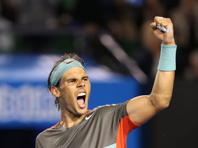 Rafael Nadal of Spain celebrates winning his semifinal match against Roger Federer of Switzerland during day 12 of the 2014 Australian Open at Melbourne Park on January 24, 2014 in Melbourne, Australia.  Photo: Getty Images