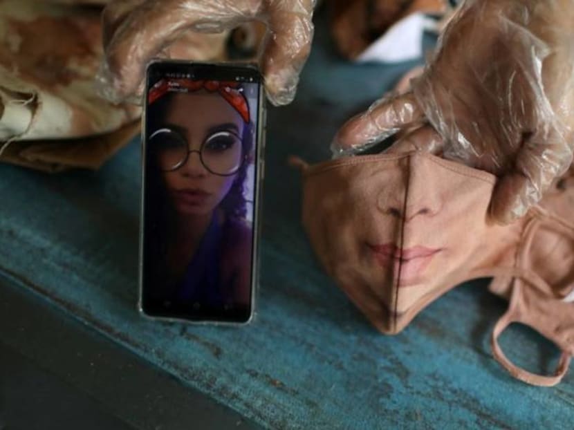 Brazil artist paints masks for those who want to show their face Brazil artist paints masks for those who want to show their face