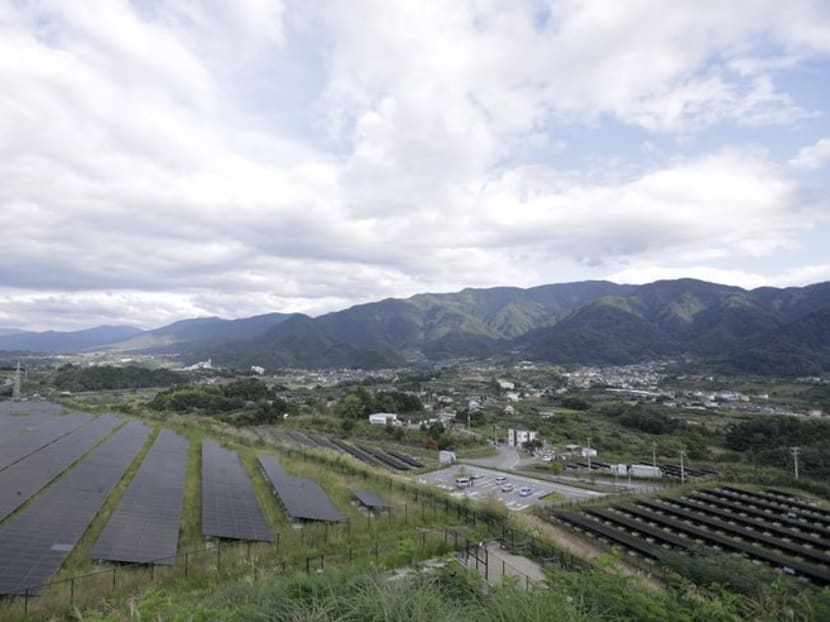 Rows of solar panels at Komekurayama solar power plant in Yamanashi prefecture. Photo: Bloomberg