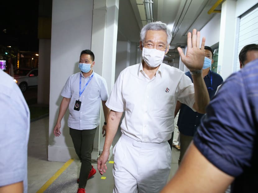 Prime Minister Lee Hsien Loong arrives at Blk 322 PAP Teck Ghee branch on July 11, 2020. Mr Lee noted that the turnout this year at the polls was higher than that in the previous general election.
