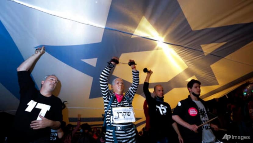 Thousands protest against Israel's Netanyahu ahead of vote Thousands protest against Israel's Netanyahu ahead of vote