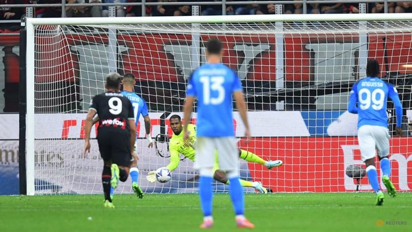 Simeone header earns Napoli 2-1 win at AC Milan Simeone header earns Napoli 2-1 win at AC Milan