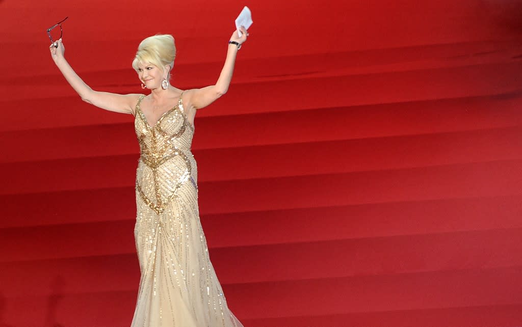 In this file photo taken on May 16, 2009, Ivana Trump enters the stage to deliver a speech during the 17th Life Ball in Vienna.
