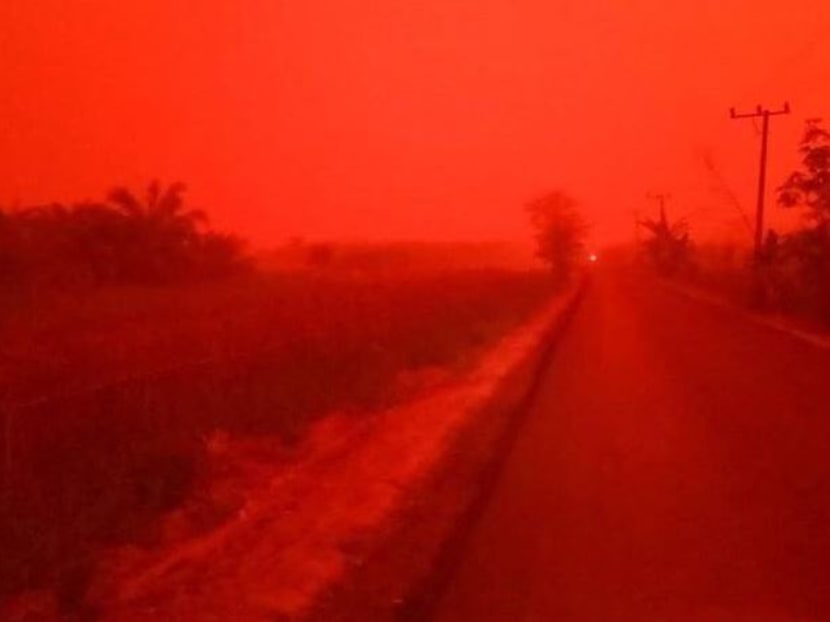 The red skies emerged against the backdrop of a worsening haze situation caused by forest fires in Indonesia. Central Sumatra, where Jambi is located, is home to many haze hot spots.