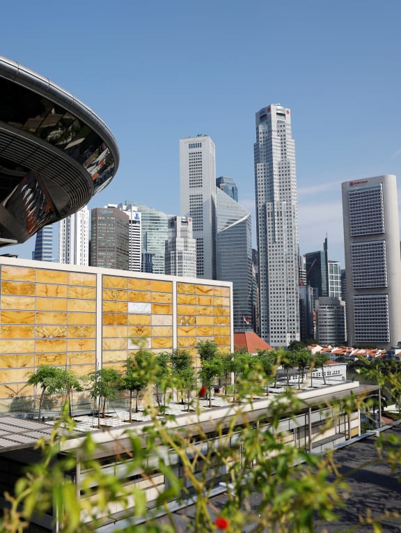 A view of the Singapore skyline next to the Supreme Court in Singapore. Photo: Reuters A view of the Singapore skyline next to the Supreme Court in Singapore. Photo: Reuters