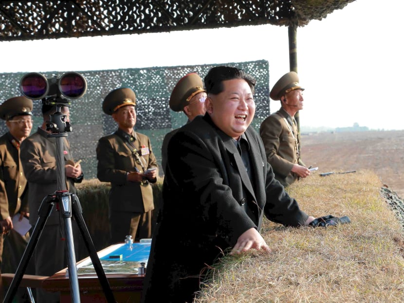 North Korean leader Kim Jong-un watches a rocket firing drill by anti-aircraft units of the Korean People's Army, in this undated file photo released by North Korea's Korean Central News Agency. Photo: Reuters