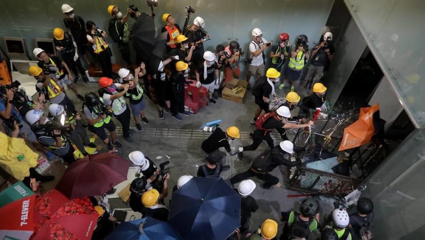 Hong Kong descends into chaos as protesters storm legislature Hong Kong descends into chaos as protesters storm legislature