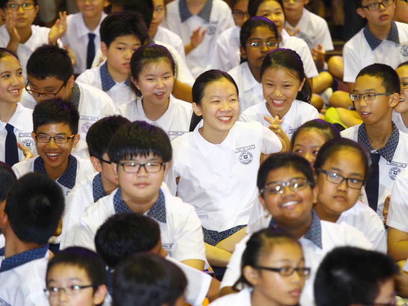 Release of PSLE results at St Hilda’s Primary School on Nov 22, 2013. Photo : Ernest Chua