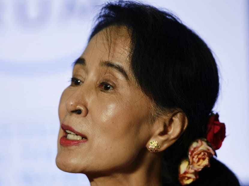 Myanmar's pro-democracy leader Aung San Suu Kyi talks to reporters during a news conference. Photo: Reuters