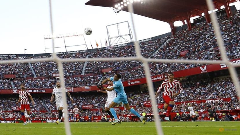 Llorente and Morata score as Atletico sink Sevilla Llorente and Morata score as Atletico sink Sevilla
