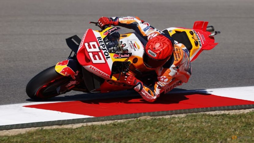 Honda's Marquez storms to pole at Portuguese Grand Prix with lap record Honda's Marquez storms to pole at Portuguese Grand Prix with lap record