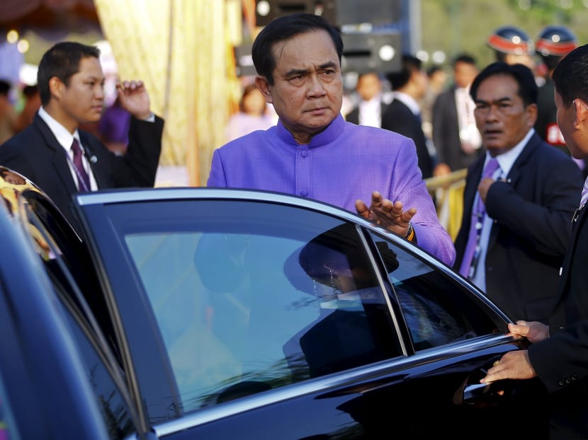 Thailand's Prime Minister Prayuth Chan-o-cha gets in his car after the merit-making ceremony on the occasion of Princess Maha Chakri Sirindhorn's birthday at Sanam Luang in Bangkok April 2, 2015. Photo: Reuters
