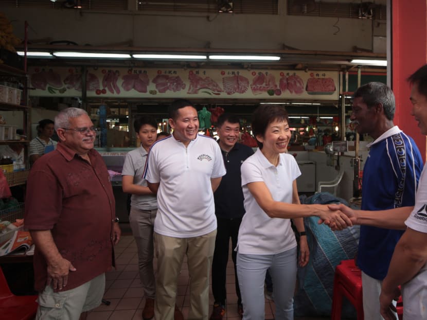 Grace Fu, Minister for Culture, Community and Youth and Woodlands Constituency Grassroots Adviser and Member of Parliament Amrin Amin chat with residents during the Minister's Ministerial Visit to Woodlands on June 11, 2017. Photo: Jason Quah/TODAY