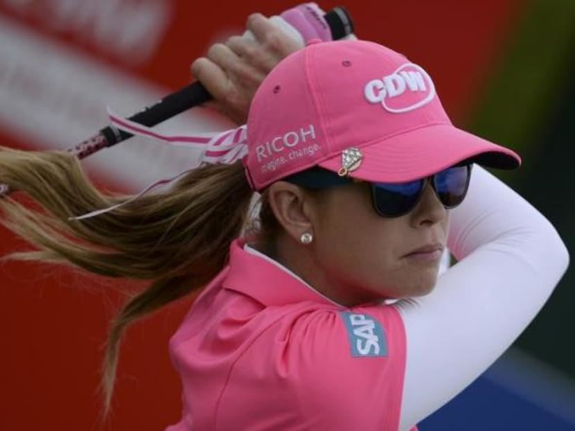Paula Creamer of US plays her tee shot at the 10th hole during the women's British Open golf tournament in 2014. Photo: Reuters