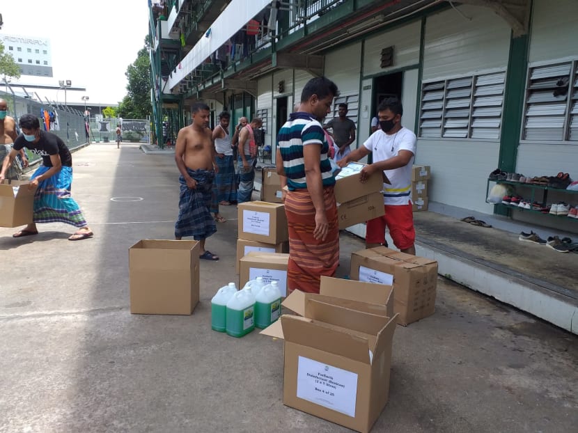 Donated hygiene supplies being distributed by foreign workers in Cochrane Lodge 2, a dormitory located in Admiralty. Donated hygiene supplies being distributed by foreign workers in Cochrane Lodge 2, a dormitory located in Admiralty.