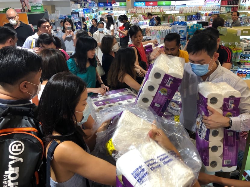 Shoppers at Fairprice Finest in Bukit Timah Plaza reaching out for toilet paper even before it got stocked in the shelves. Shoppers at Fairprice Finest in Bukit Timah Plaza reaching out for toilet paper even before it got stocked in the shelves.