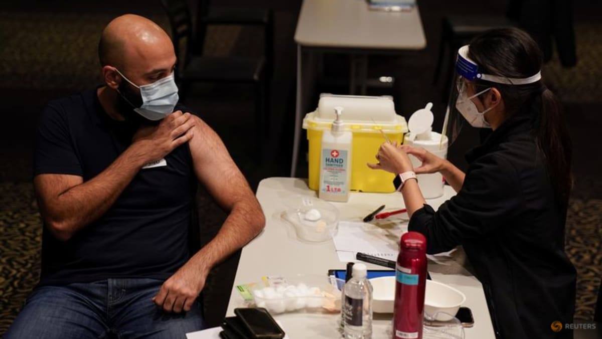 Australia mencapai ‘tonggak luar biasa’ dengan tingkat vaksinasi 80%
