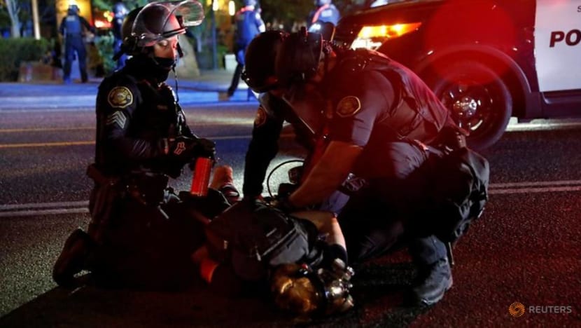 Portland police use tear gas, arrest more than 20 after declaring 'riot' Portland police use tear gas, arrest more than 20 after declaring 'riot'