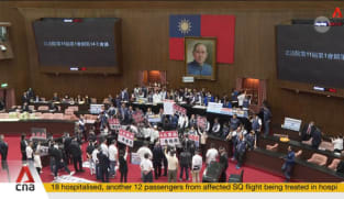 Protests erupt in Taiwan parliament over push for legislative reforms