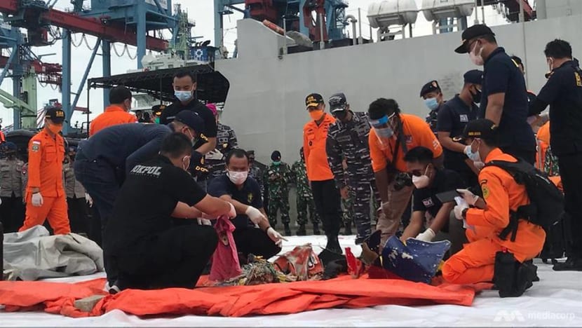 More debris found as Indonesian authorities race against time to search for missing Sriwijaya Air plane
